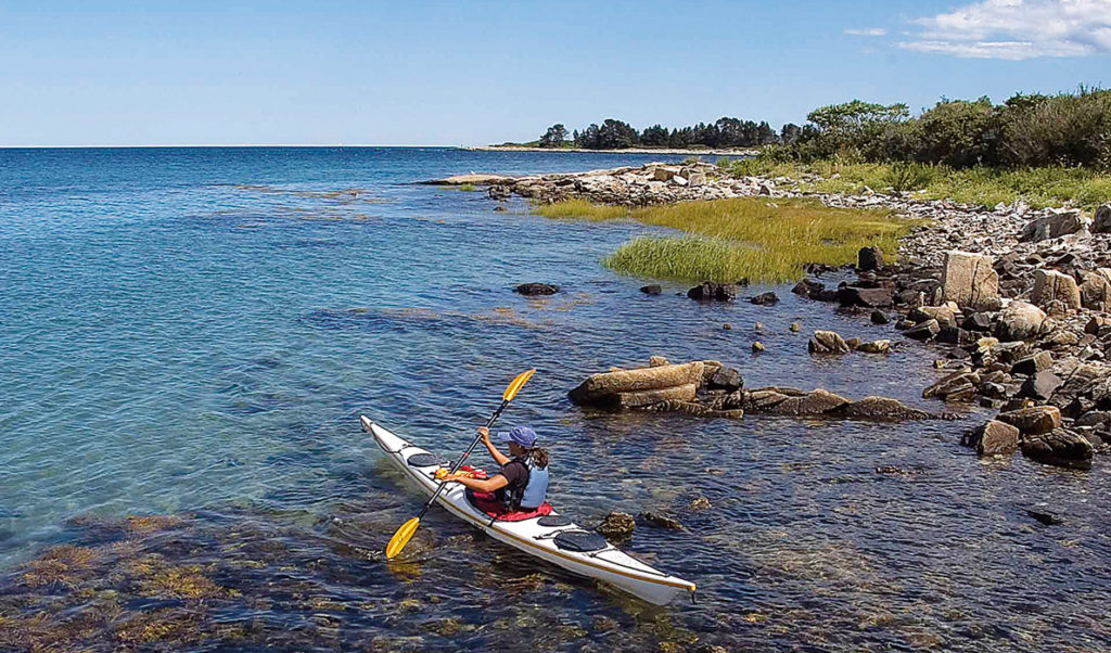 A kayaker explores one of the islands on the trail.