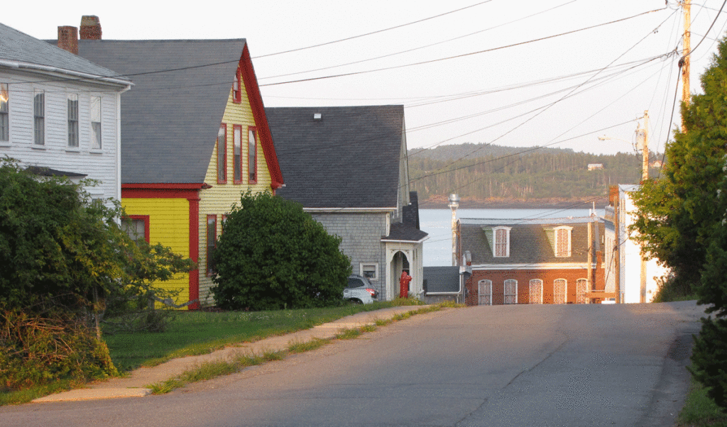 The late afternoon sun strikes a brick building in Eastport.