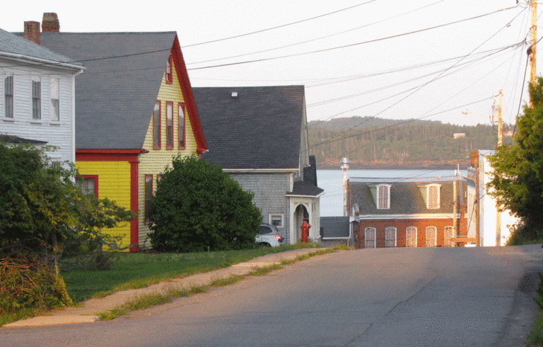 The late afternoon sun strikes a brick building in Eastport.