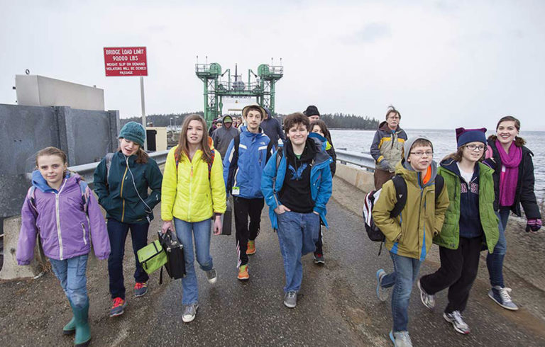 Students disembark from the ferry on Islesboro.