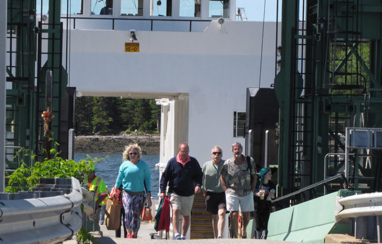 Passengers disembark from the Islesboro ferry in Lincolnville Beach.