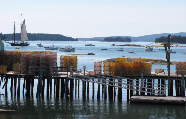 Traps stacked on a pier in Stonington.