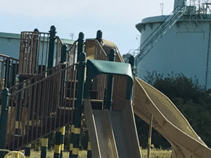 This photo, provided by South Portland’s Roberta Zuckerman, show the proximity of oil tanks to a playground.