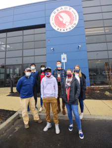 Ready Seafood’s 52,000-square-foot lobster processing facility in Saco, built in 2019, is the largest such operation in Maine. Front row, from left are Curt Brown, Francisco Bumba, and Lori Talbot. Back row, from left, Van Bo, Pamela Lukasa, Lee Stafford, and Korina Costanzo. PHOTO: KELLI PARK