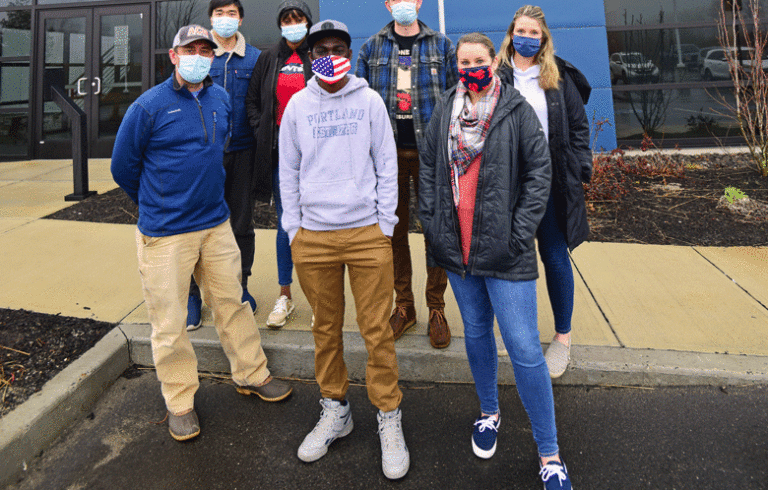 Ready Seafood’s 52,000-square-foot lobster processing facility in Saco, built in 2019, is the largest such operation in Maine. Front row, from left are Curt Brown, Francisco Bumba, and Lori Talbot. Back row, from left, Van Bo, Pamela Lukasa, Lee Stafford, and Korina Costanzo. PHOTO: KELLI PARK