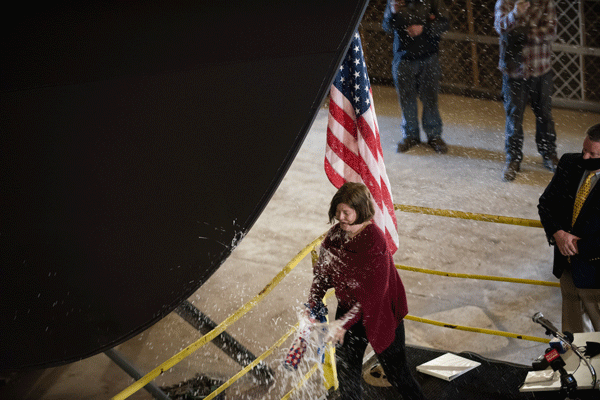 The late Richard Spear’s daughter Linda christens the new ferry.