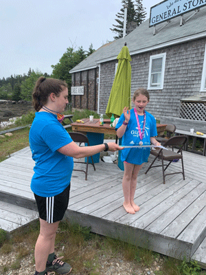 Gianna gets her award from Robin Chernow.