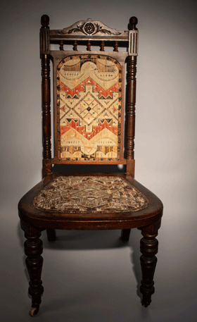 A high-back chair from the 19th century. PHOTO: COURTESY ABBE MUSEUM