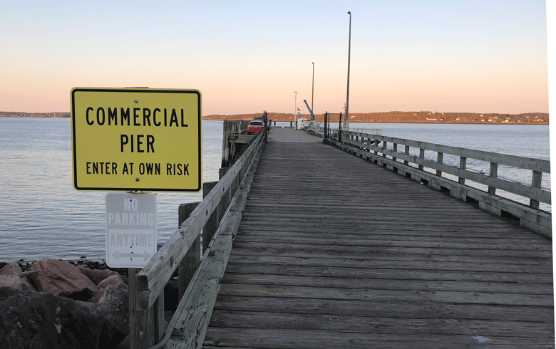 A working waterfront with a warning. PHOTO: TOM GROENING