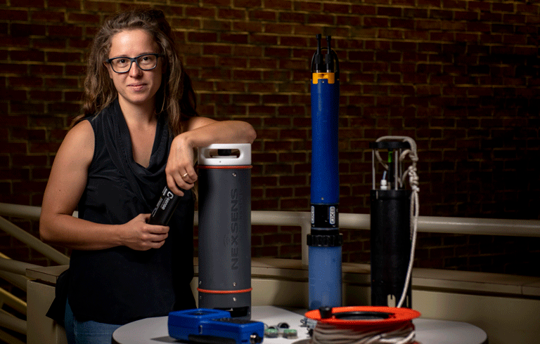 Václava "Vendy" Hazuková poses withi senors used in her research.