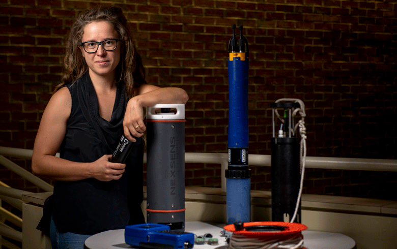 Václava "Vendy" Hazuková poses withi senors used in her research.