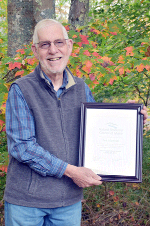 Saltonstall with his award certificate.