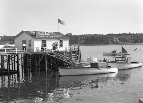 A sightseeing boat is shown at Beal's Fish Wharf in Southwest Harbor on June 14, 1938. PHOTO: COURTESY SOUTHWEST HARBOR PUBLIC LIBRARY.