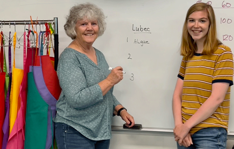 Colleen Haskell, DEI's education director, poses with Hannah Greene. PHOTO: LESLIE BOWMAN