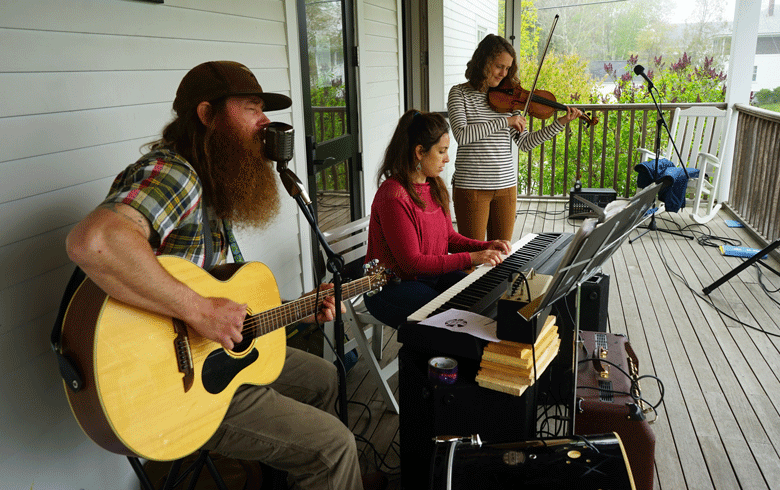 rom left, Tom Stevens, Natasha Stevens, and Anne McKee, who sometimes perform as the Dark Harbor Trio. They played during the Islesboro Energy Jamboree on Saturday, May 21.