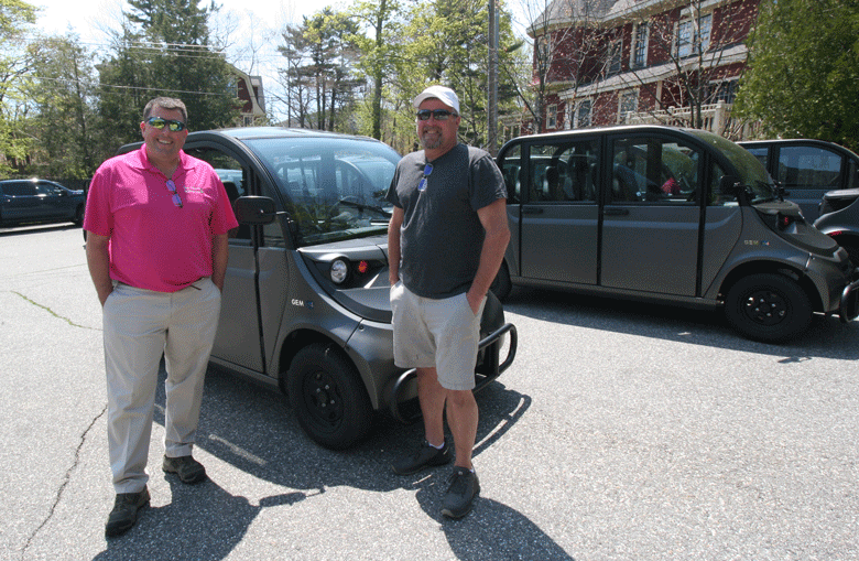 Eben Salvatore, left, and Jeff Young, who are introducing the electric vehicles to Acadia and Bar Harbor. PHOTO: LAURIE SCHREIBER