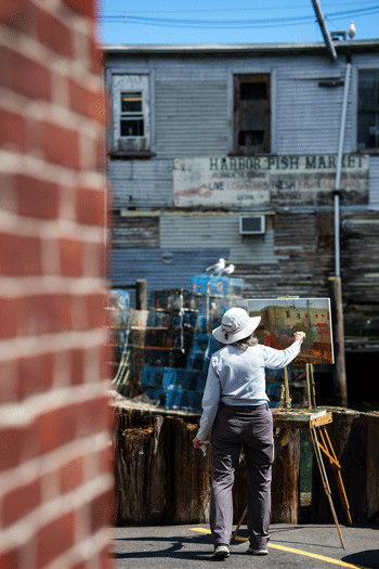 Tina Ingraham painting on Portland's waterfront.