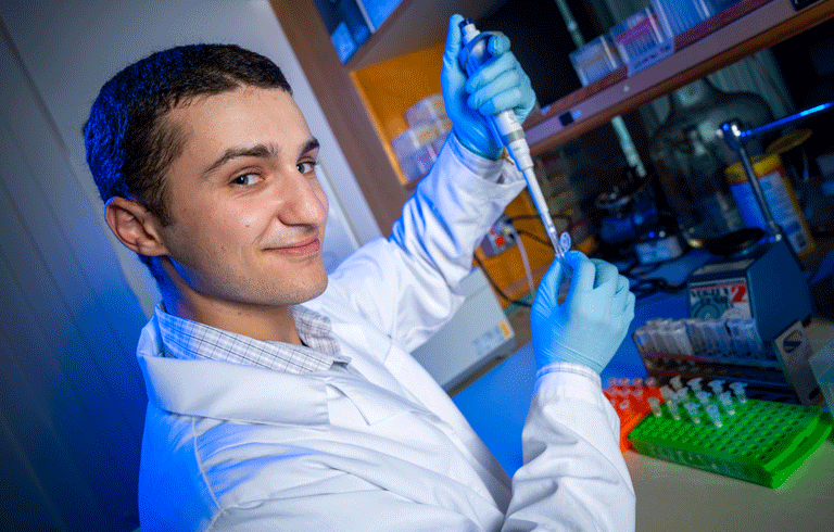Luke Goldman working with eDNA. PHOTO: COURTESY UNIVERSITY OF MAINE