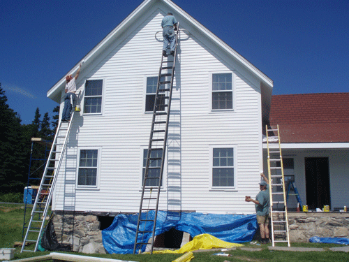 Exterior painting underway, completed mostly by volunteers.