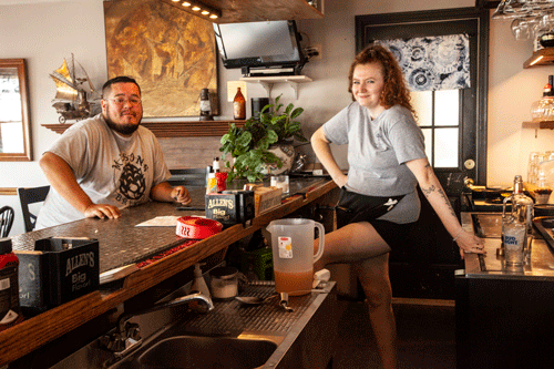 Nicole Perkins behind the bar. PHOTO: LESLIE BOWMAN