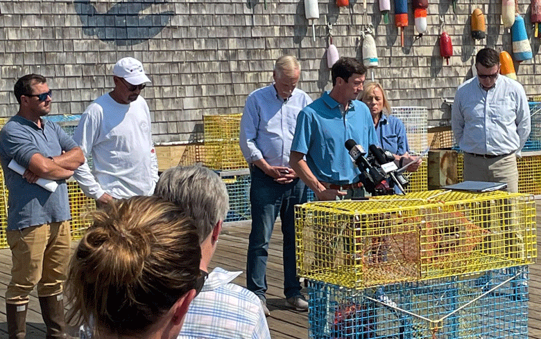 From left, Curt Brown, Casco Bay lobsterman Steve Train, Sen. Angus King, Luke Holden of Luke’s Lobster, Gov. Janet Mills, and Department of Marine Resources Commission Patrick Keliher. PHOTO: SAM BELKNAP