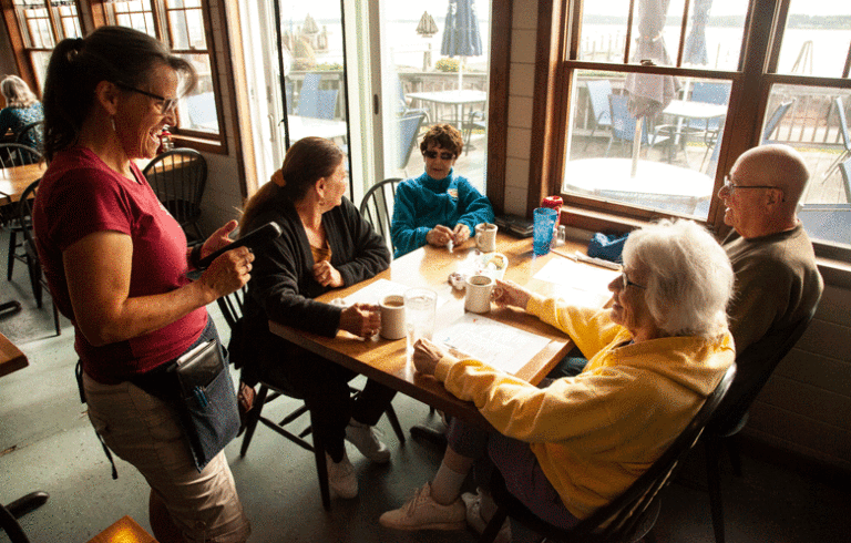 Tammy McPhail serves some breakfast customers at the WaCo Diner.