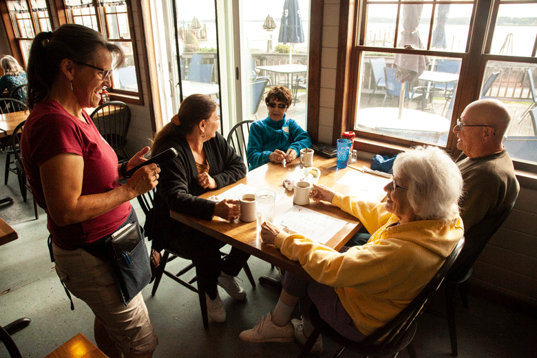 Tammy McPhail serves some breakfast customers at the WaCo Diner.