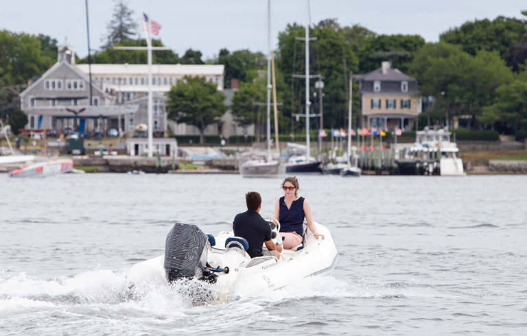 A boat underway powered by an electric outboard in Bristol, R.I. PHOTO: JACK SULLIVAN