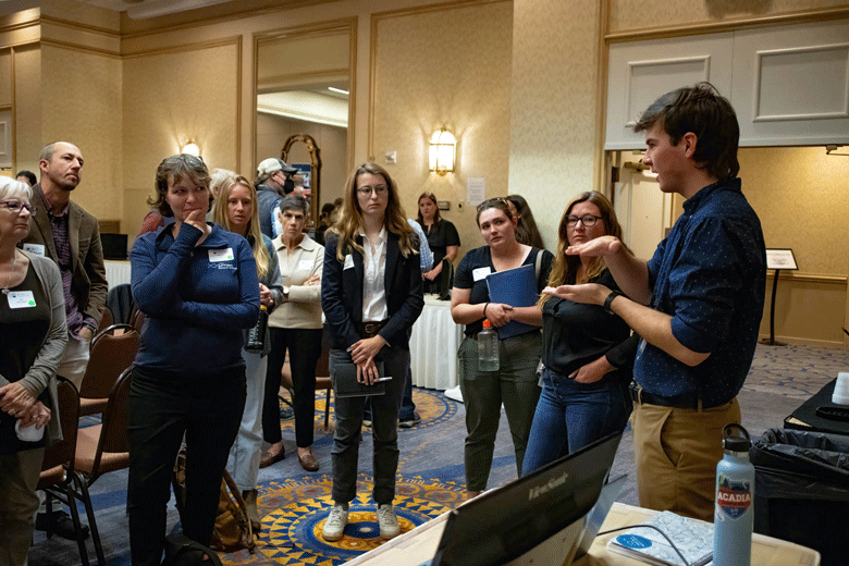 Those attending the Island Institute's Climate Symposium listen to a presenter. PHOTO: JACK SULLIVAN