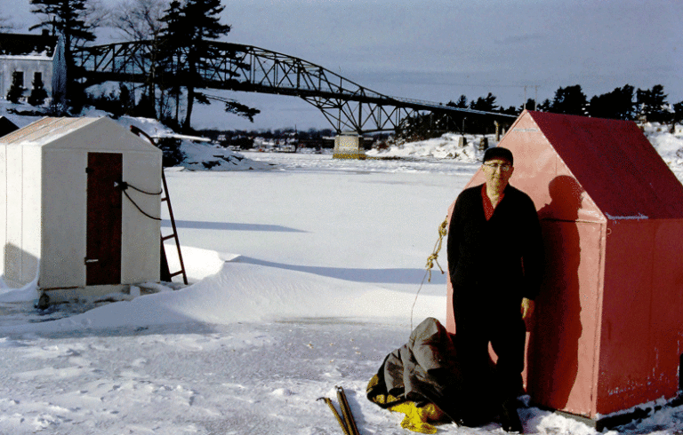 Bernard Henderson poses with his smelting shack on the Sasanoa River in 1962. PHOTO: MAINE MARITIME MUSEUM