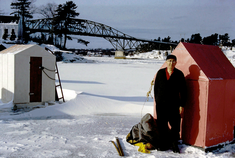 Bernard Henderson poses with his smelting shack on the Sasanoa River in 1962. PHOTO: MAINE MARITIME MUSEUM