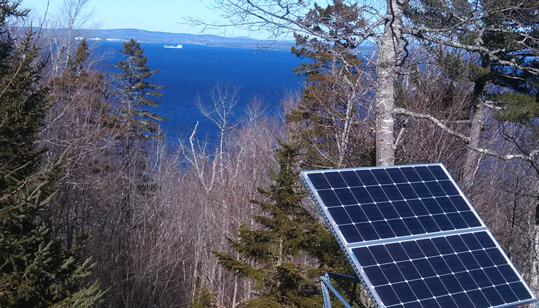 A photovoltaic panel in a yard on Islesboro. FILE PHOTO: TOM GROENING