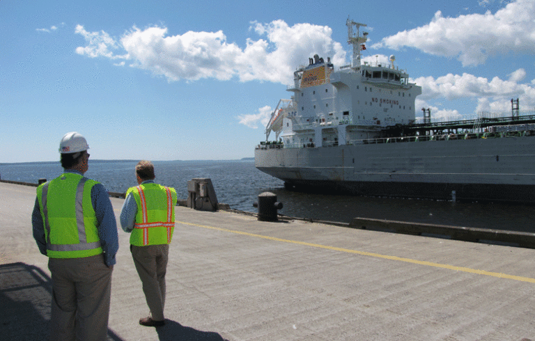 Maine Department of Transportation officials watch an Irving ship near the Mack Point terminal in Searsport in 2013. FILE PHOTO: TOM GROENING