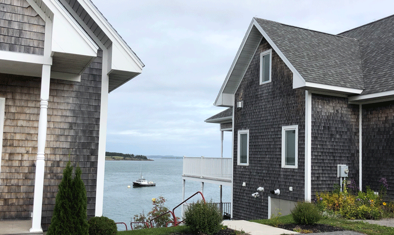 A view of Johnson Bay in Lubec from between two houses.