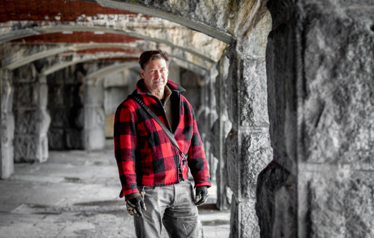 Paul Drinan, executive director of the Friends of Fort Gorges, poses inside the fort in Portland Harbor during a tour.