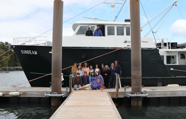 Maine Seacoast Mission’s Sunbeam docked in Northeast Harbor with the Planet Pan steel drum band.