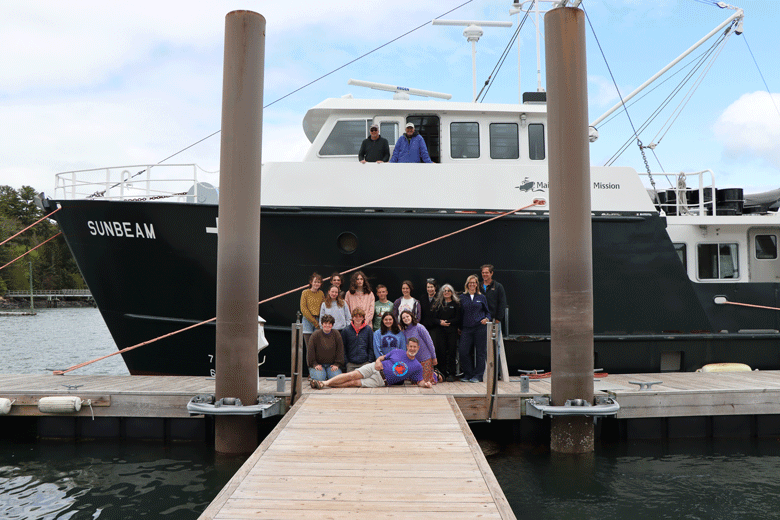 Maine Seacoast Mission’s Sunbeam docked in Northeast Harbor with the Planet Pan steel drum band.