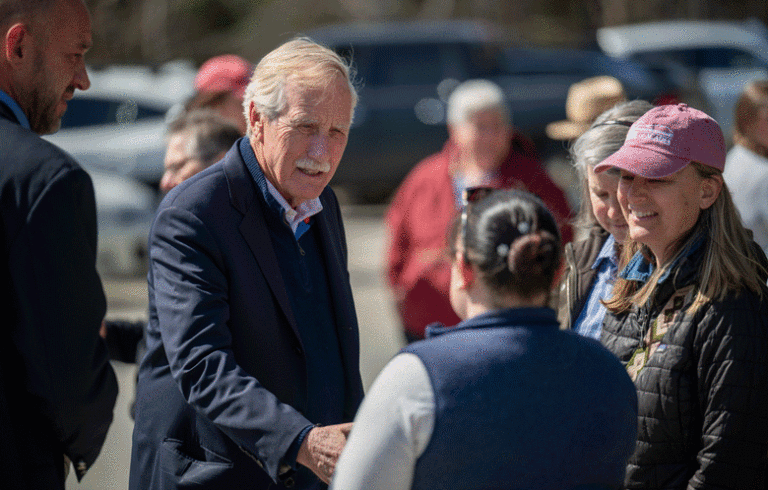 Sen. Angus King converses with Friends of Acadia staff at the groundbreaking event for Acadia National Park's new maintenance facility.