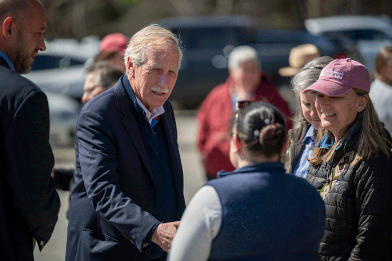 Sen. Angus King converses with Friends of Acadia staff at the groundbreaking event for Acadia National Park's new maintenance facility.