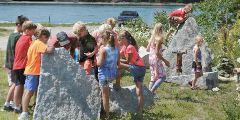 Children play at one of the stops along the Schoodic Byway.