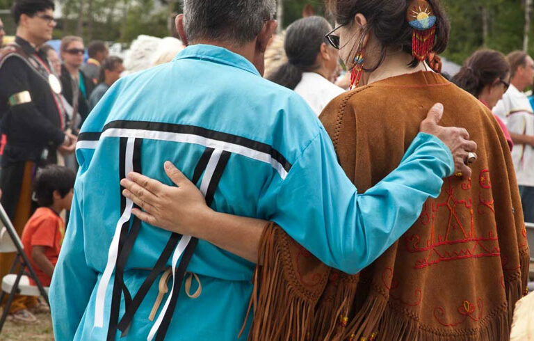 Passamaquoddy Tribe members gather at a ceremony. FILE PHOTO: LESLIE BOWMAN