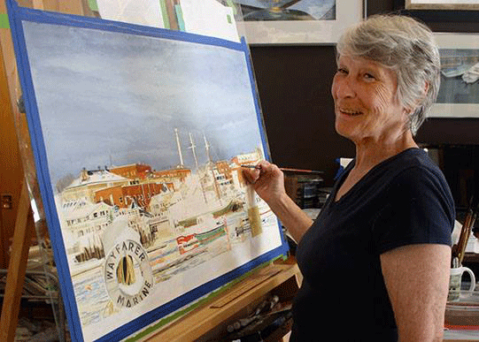 Linda Norton at the easel in her Camden studio. PHOTO: COURTESY REBECCA HODGE