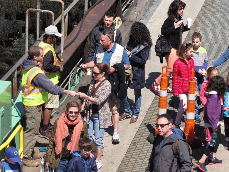 Passengers board a Casco Bay Lines ferry in Portland. FILE PHOTO: TOM GROENING