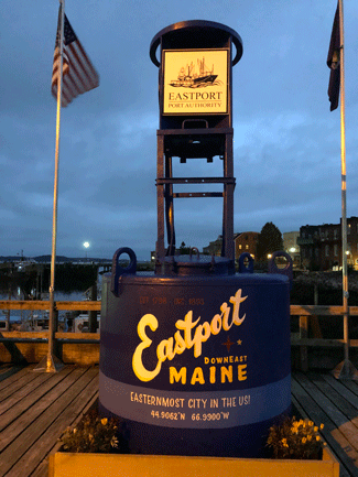Eastport’s buoy in its setting on the city’s breakwater on a foggy night in August. PHOTO: TOM GROENING