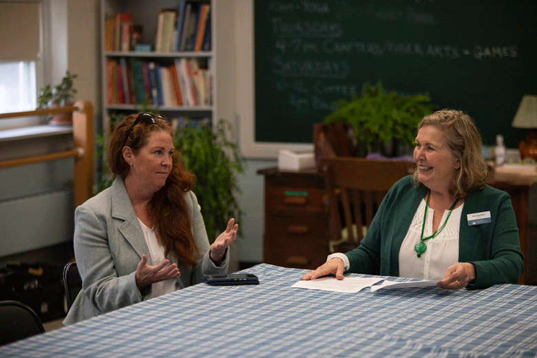 Rhiannon Hampson, left, state director of the U.S. Department of Agriculture, joins Kim Hamilton, Island Institute president at an event announcing the nonprofit being awarded two key grants. PHOTO: JACK SULLIVAN