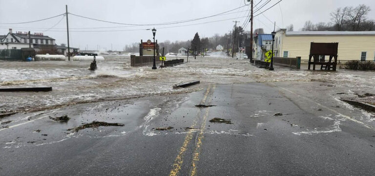 A storm in March pushes water from Penobscot Bay over Route 1 in Lincolnville Beach. PHOTO: JUDY BERK