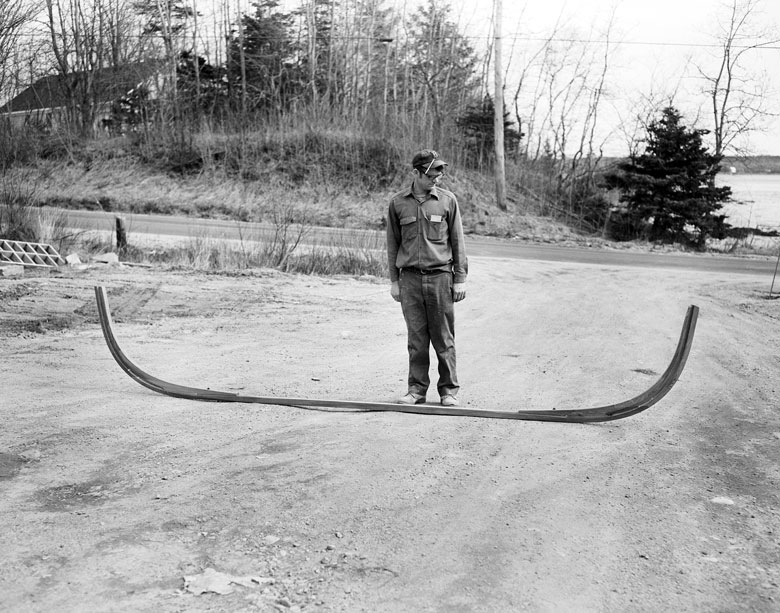 Jimmy Steele poses with the beginnings of one of his legendary peapods in a photo by Everett “Red” Boutilier. PHOTO: PENOBSCOT MARINE MUSEUM