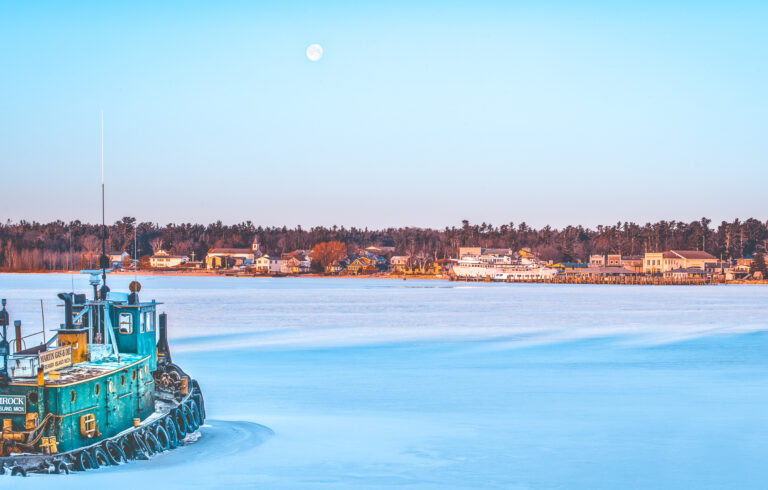 An icebreaker works toward Beaver Island.