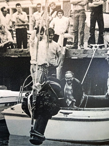 A cannon from the Defence is hoisted ashore at the Maine Maritime Academy in Castine in the 1970s.