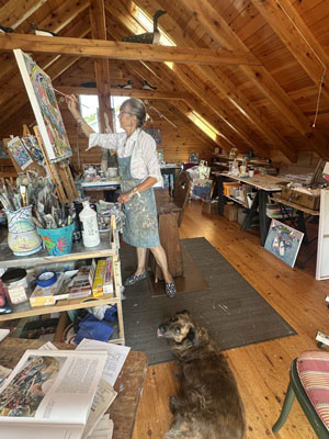 Jillian Herrigel in her West Point studio with Annie, a rescue dog, looking on. PHOTO: RODGER HERRIGEL